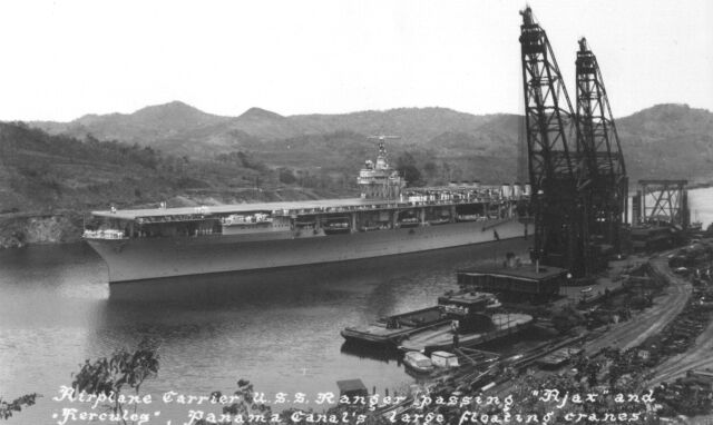 Airplane Carrier U.S.S. Ranger passing "Ajax" and "Hercules", Panama Canal's large floating cranes. 